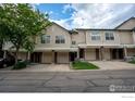 Inviting townhome featuring a well-manicured lawn and private garages at 2092 N Concord Ln, Superior, CO 80027