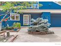 Inviting front entrance with a decorative door and well-maintained landscaping at 2485 Lee Hill Dr, Boulder, CO 80302