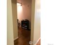 Hallway view showcasing the seamless flow of the open-concept layout with access to other rooms at 2295 E Asbury Ave # 206, Denver, CO 80210