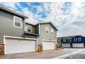 Spacious attached garage with multiple bays, offering ample parking and storage at 749 Robert St, Longmont, CO 80503