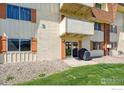 Ground floor walkout unit with BBQ area at 10211 Ura Ln # 104, Thornton, CO 80260