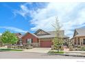 A well-maintained home with a manicured lawn, attractive exterior, and inviting curb appeal at 1130 Summit View Dr, Louisville, CO 80027