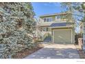 Charming two-story home with a well-maintained yard and an attached one car garage at 1149 Quince Ave, Boulder, CO 80304