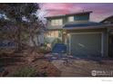 Charming two-story home with a well-maintained yard and an attached one car garage at 1149 Quince Ave, Boulder, CO 80304