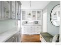 Hallway with bench seating and stylish cabinetry, a blend of colors at 2424 4Th St, Boulder, CO 80304