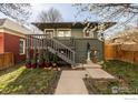 Inviting home featuring a front porch with well-maintained landscaping and walkway at 3233 Meade St, Denver, CO 80211