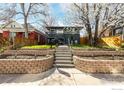 Front exterior with beautiful brickwork and landscaping leading to the front steps at 3233 Meade St, Denver, CO 80211