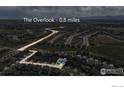 Stunning aerial view of the community showcasing the beautiful homes and landscape at 832 Sundown Way, Erie, CO 80516