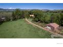 A nice long shot of the property with the outbuilding at 12855 N 66Th St, Longmont, CO 80503
