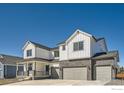 Beautiful two story home featuring a three car garage and welcoming front porch at 2710 Crystal Springs, Longmont, CO 80503