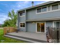 Backyard showcasing a spacious wooden deck, ideal for outdoor relaxation and enjoying the property at 4140 Monroe Dr # C, Boulder, CO 80303