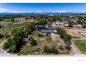 A single-Gathering home on a large lot in a residential area with mountain views at 10007 E County Line Rd, Longmont, CO 80501