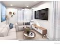 Cozy living room featuring comfortable seating, modern decor, and a sleek entertainment center at 1606 W 166Th Ave, Broomfield, CO 80023