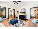 Inviting living room with hardwood floors, comfortable seating, and an open layout with seamless flow at 300 E Cleveland St, Lafayette, CO 80026