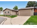 Exterior view of home featuring a detached garage and driveway at 9306 Ingalls St, Westminster, CO 80031