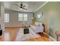 Comfortable living room features hardwood floors, stylish decor, and neutral accents at 1235 Leyden St, Denver, CO 80220