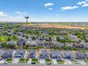 A birds-eye view of homes in the community next to a open field and close to I-25 at 16860 Mckay Dr, Mead, CO 80542