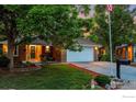 Charming single Gathering home with a well-maintained lawn and inviting entrance at 2229 S Elkhart St, Aurora, CO 80014