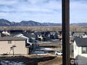 A lovely neighborhood with mountain views; perfect for families and outdoor enthusiasts at 964 Saint Andrews Ln, Louisville, CO 80027
