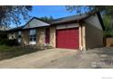 Charming one-story home with brick facade and red door and garage at 12820 Dexter St, Thornton, CO 80241