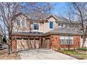 Spacious home featuring a three-car garage and inviting curb appeal in a desirable neighborhood at 5017 Bella Vista Dr, Longmont, CO 80503
