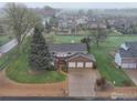 Aerial view of the home showcasing the mature trees and expansive lot at 7505 Estate Cir, Niwot, CO 80503