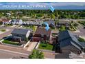 Aerial view of the property, showcasing the home's location near Rough & Ready Park at 2190 Winding Dr, Longmont, CO 80504