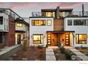 Modern home with a roof deck features clean lines, large windows, and unique wood and stucco accents at 2248 S Lincoln St, Denver, CO 80210