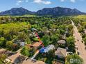 Aerial view of the property showcasing its location and neighborhood with mature trees at 325 Colgate St, Boulder, CO 80305