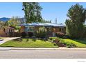 This well-maintained home has a lovely yard and beautiful brick exterior at 325 Colgate St, Boulder, CO 80305