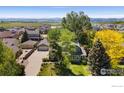 Expansive aerial view of a residential neighborhood showcasing the home's desirable location with mountain views at 531 S 9Th St, Berthoud, CO 80513