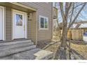 Close-up of exterior showcasing unit number, siding, and lattice accent at 4529 Barnacle Ct, Boulder, CO 80301