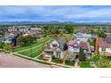 Aerial view showcases the home's location within a residential neighborhood with mountain views at 2369 Hecla Dr, Louisville, CO 80027