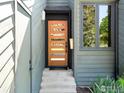 A stylish front door with sidelight windows leads inside at 3470 16Th Cir, Boulder, CO 80304