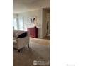 Cozy living room featuring a neutral color palette and comfortable seating at 1087 Lilac St, Broomfield, CO 80020