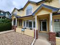 Charming townhome with covered porch, well-maintained landscaping, and inviting curb appeal at 2855 Rock Creek Cir # 200, Superior, CO 80027
