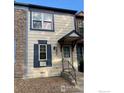 Charming two-story home with a classic design, featuring stone accents, and a welcoming covered entryway at 2929 W 81St Ave # H, Westminster, CO 80031