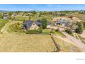 Expansive home on a beautiful lot featuring fencing and mature landscaping at 3412 Erving Ct, Berthoud, CO 80513