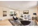 Bright living room features hardwood floors, neutral walls, modern furniture, and stylish decor at 630 S 45Th St, Boulder, CO 80305