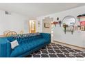 Comfortable living room with modern decor and a view into the kitchen at 2802 Sundown Ln # 102, Boulder, CO 80303
