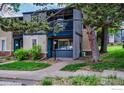 Two-story townhome with a private balcony and tidy landscaping at 790 W Moorhead Cir # A, Boulder, CO 80305