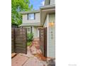 View of the side exterior featuring stone walkway and address number at 1409 Quince Ave, Boulder, CO 80304