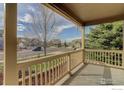 Inviting porch view overlooking the neighborhood, perfect for relaxing and enjoying the outdoors at 3008 Mountain Sky Dr, Castle Rock, CO 80104