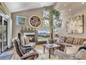 Inviting living room with a fireplace, large windows, and stylish decor with ample seating at 3345 15Th St, Boulder, CO 80304