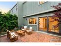 Inviting brick patio featuring outdoor seating perfect for entertaining or relaxation at 93 Benthaven Pl, Boulder, CO 80305