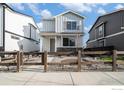 Attractive two-story house with a well-manicured front yard and welcoming entrance at 1099 Spartan Ave, Berthoud, CO 80513