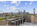 Rooftop deck offering panoramic city views, complete with stylish bar seating at 800 N Washington St # 409, Denver, CO 80203