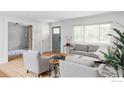 Bright living room with hardwood floors and modern furnishings at 3445 Martin Dr, Boulder, CO 80305