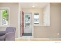 Welcoming entryway with abundant natural light, tiled floors, and neutral paint tones at 4620 15Th St # C, Boulder, CO 80304