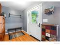 Cozy entryway featuring wood floors, storage, and a view to the outdoors at 50 S 31St St, Boulder, CO 80305
